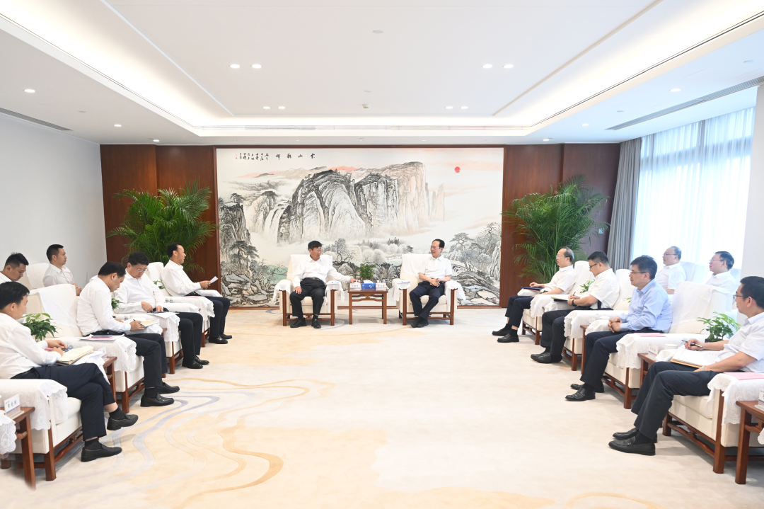 中國電建黨委書記、董事長丁焰章與中國三峽集團董事長、黨組書記劉偉平會談